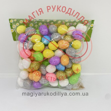 Декоративні яйця з пінопласту h2см вкриті глітером (набір 100шт) - кольорові 16827